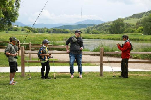 Young boys fly fishing in Utah