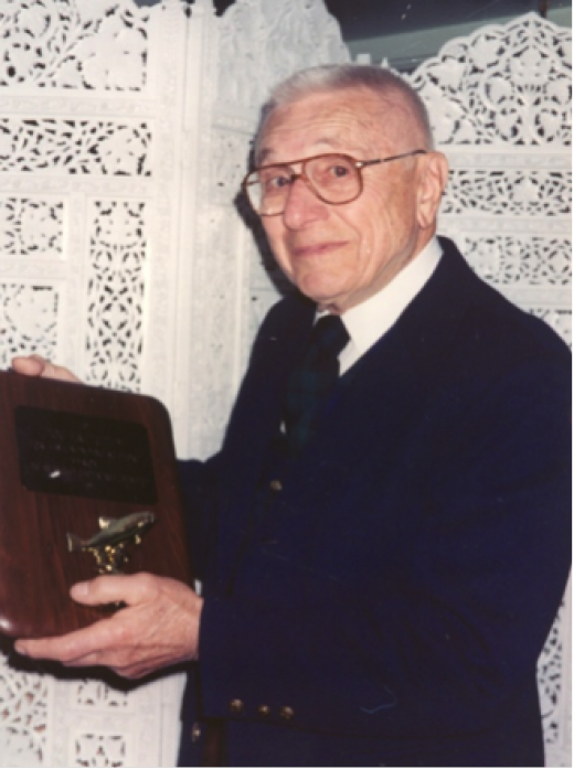 “Doc” receiving award from his namesake chapter in 1998